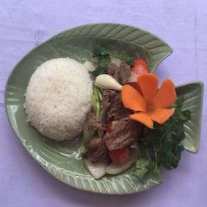 Sauteed beef served with steamed rice