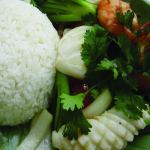Sauteed seafood served with steamed rice