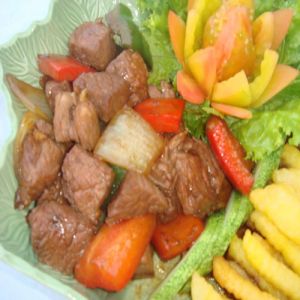 Sauteed Cubed Beef with bell pepper, served with French Fries